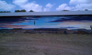 Vistas and mesas under a colorful sky.