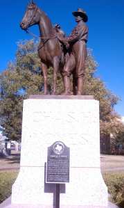 Statue and marker is a tribute to son Charles and all Texas cowboys.
