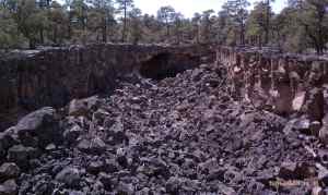 Lava tube collapse with seven natural bridges.