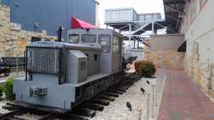 Another quarry artifact sits in a mall walkway.