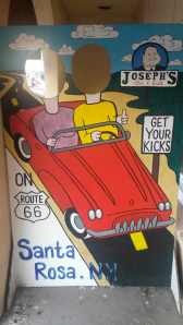 That car is either very wide or that road is really narrow.