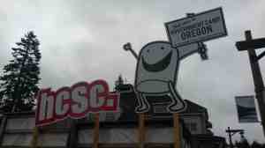 A large marshmallow with face, arms, and legs.