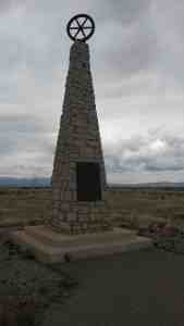 A monument against a gray sky.