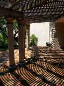 The sun and architecture are making art.