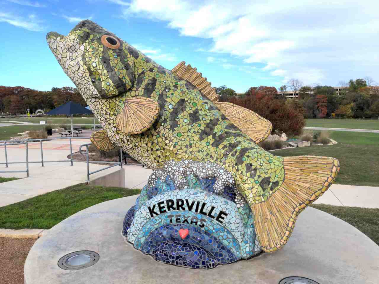 Mosaic sculpture of a large bass fish.