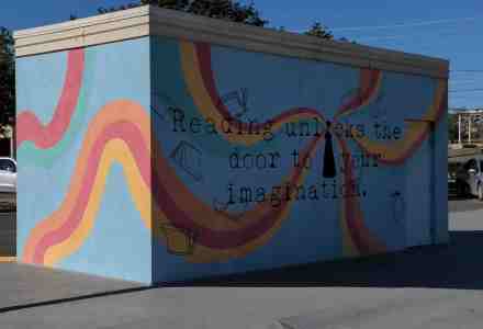 Mural depicts imagination unlocked from reading.