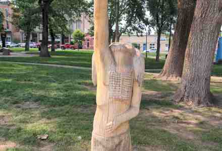 Carved sculpture called "Cry to the Ages" in the town plaza.