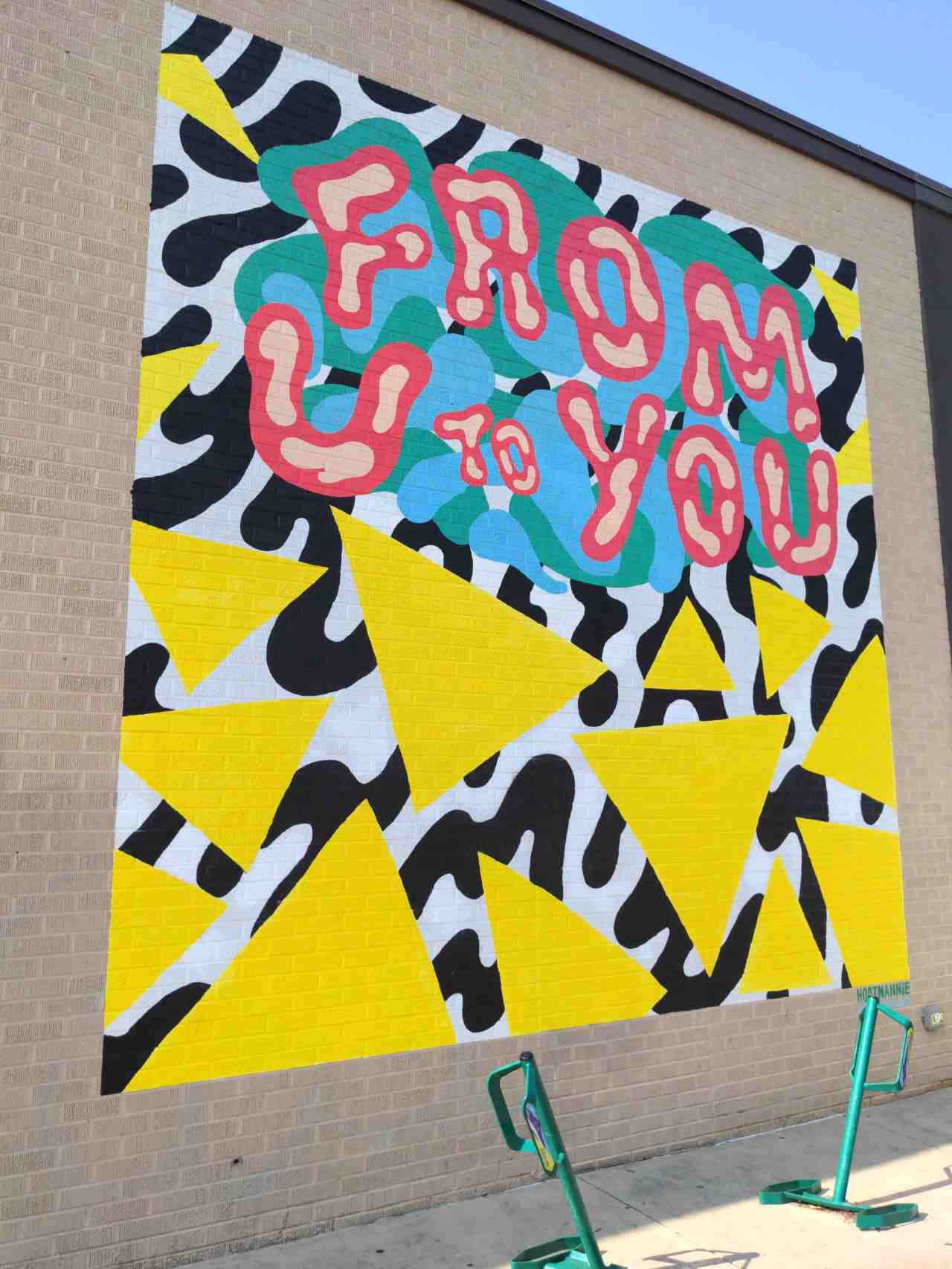 Building wall mural of color and graphic shapes.