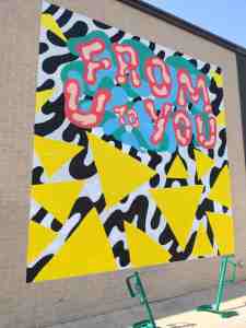 Building wall mural of color and graphic shapes.