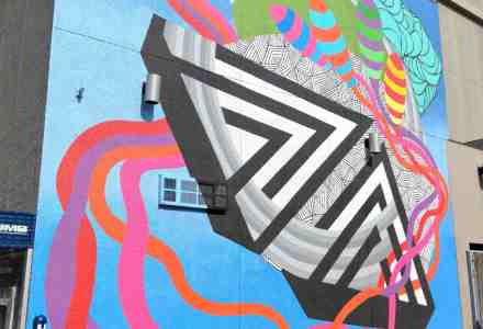 Mural of colorful geometric shapes.