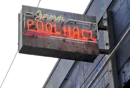 Old neon sign for Gerard's Pool Hall and Bar.