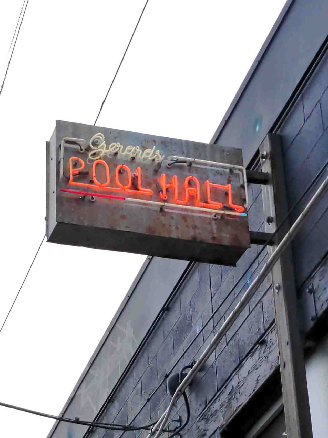 Old neon sign for Gerard's Pool Hall and Bar.