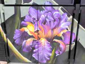 Mural of a giant orchid with vivid colors.